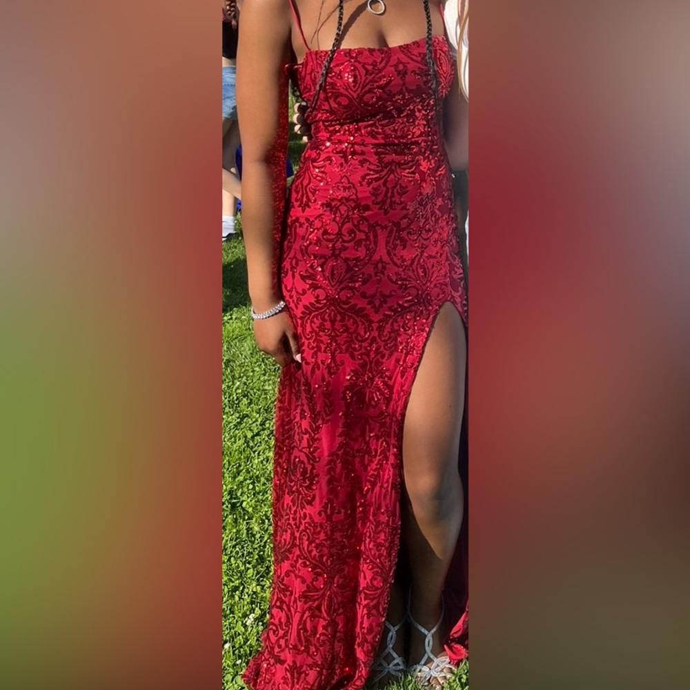 Red slit prom dress. Only worn once. Size:Medium